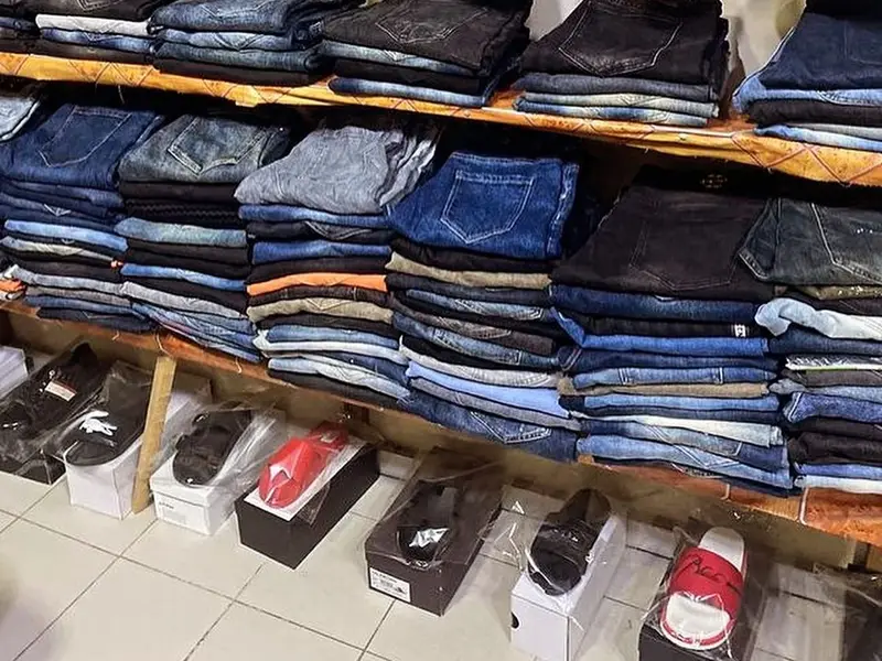 Men\x27s jeans, caps and slides at Tejuosho Market, Yaba